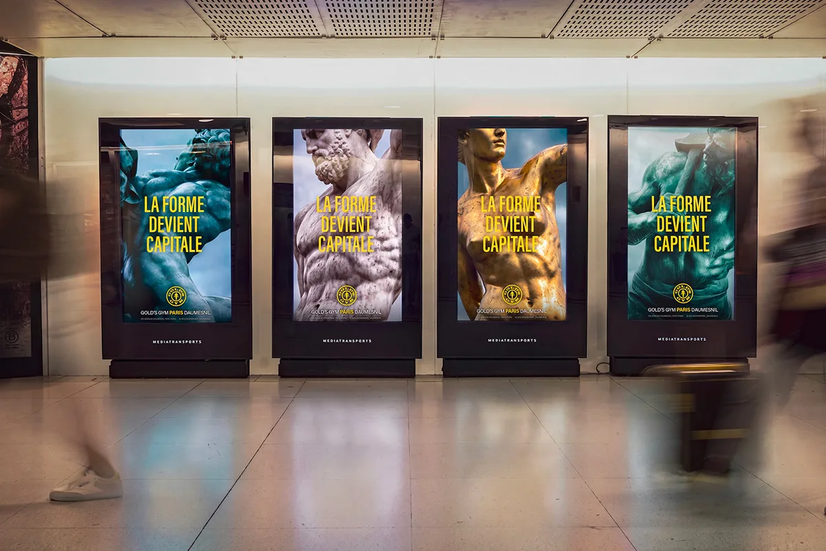 Gold's Gym enters Paris proper with a campaign built on its statues