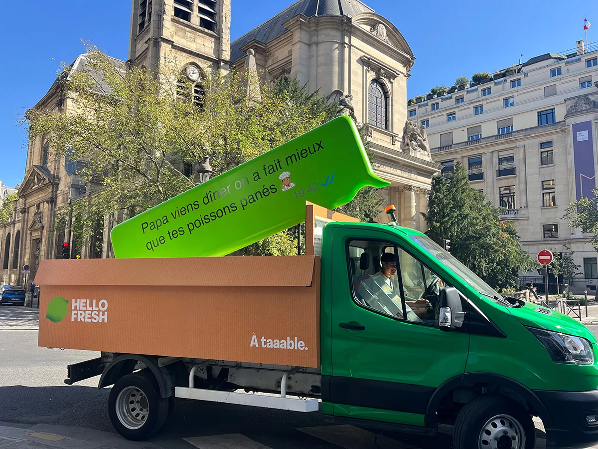 HelloFresh drives a giant text bubble through Paris to defend dinner
